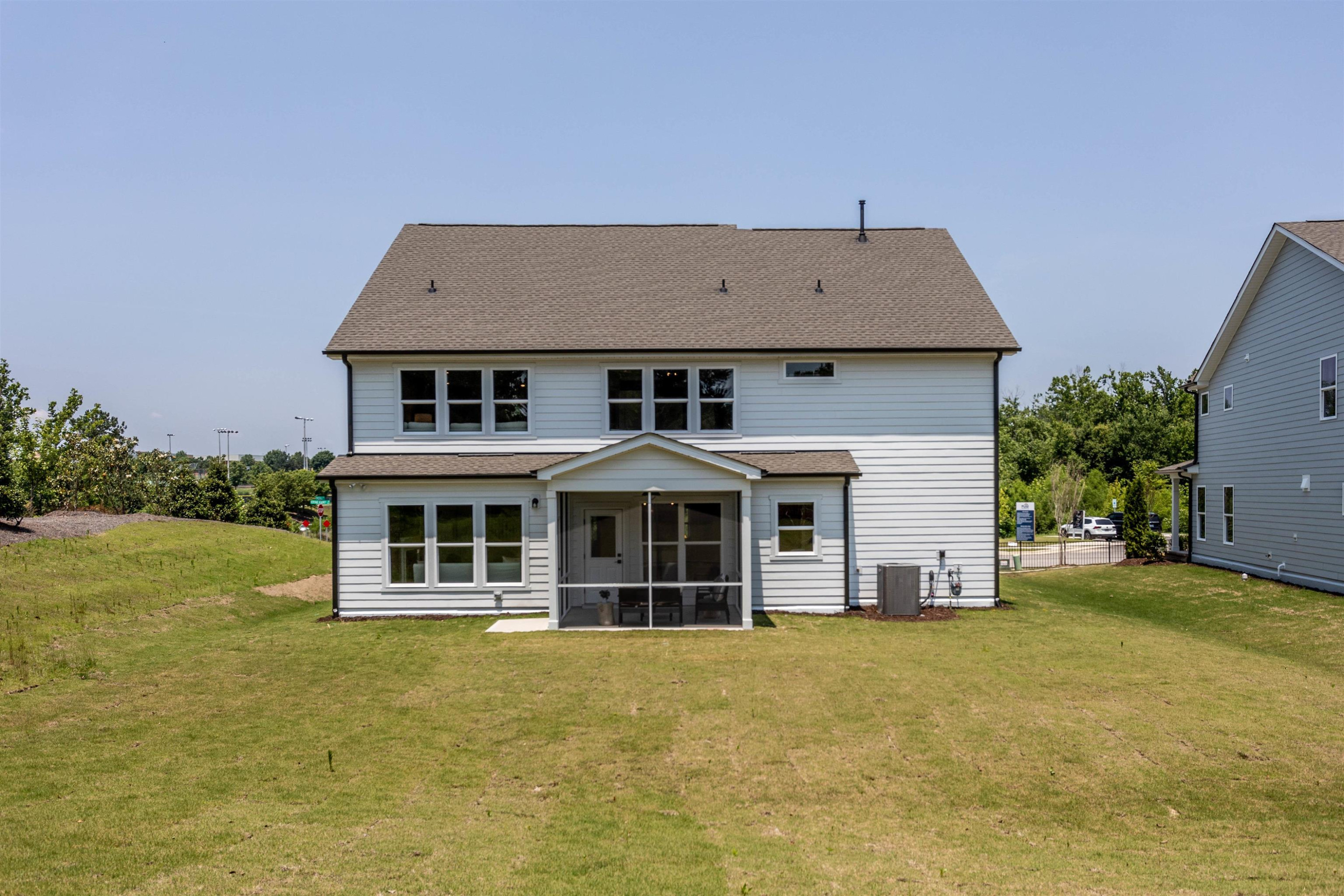 300 Heritage Regency Drive Wake Forest, NC 27587 - Photo 31 of 31 front view of a house with a yard