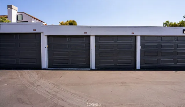 a view of a swimming pool with lounge chair
