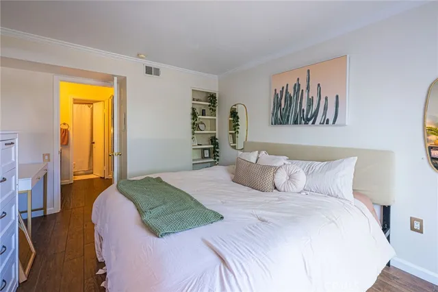 a bathroom with a toilet a sink and a mirror