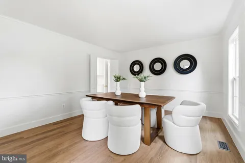 a bathroom with a toilet sink and tub