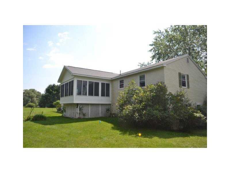 153 Rogers Road Yarmouth, ME 04096 - Photo 3 of 24 Exterior Back. Sun room has windows...