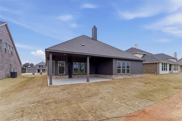 a house with yard in front of it