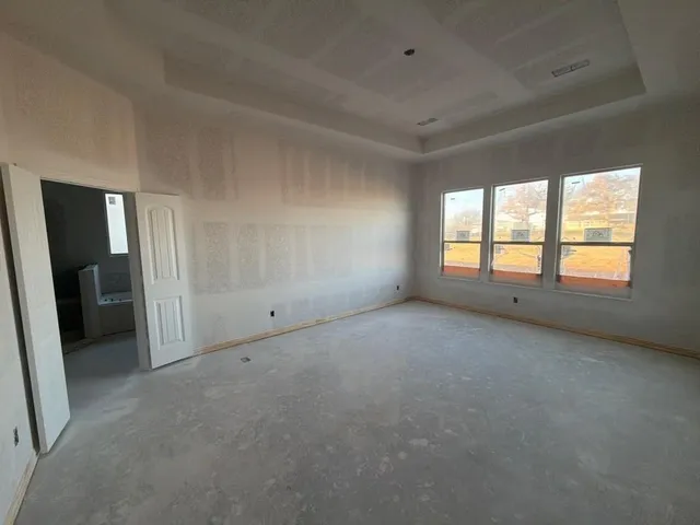 an empty room with windows