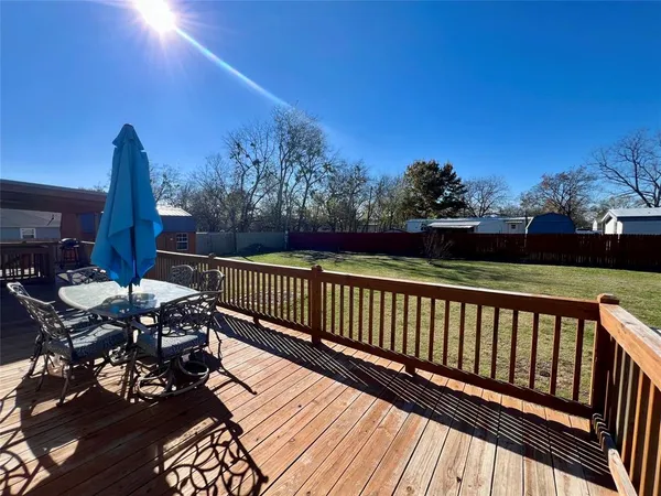 a view of balcony with furniture