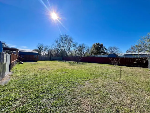 a view of outdoor space and yard
