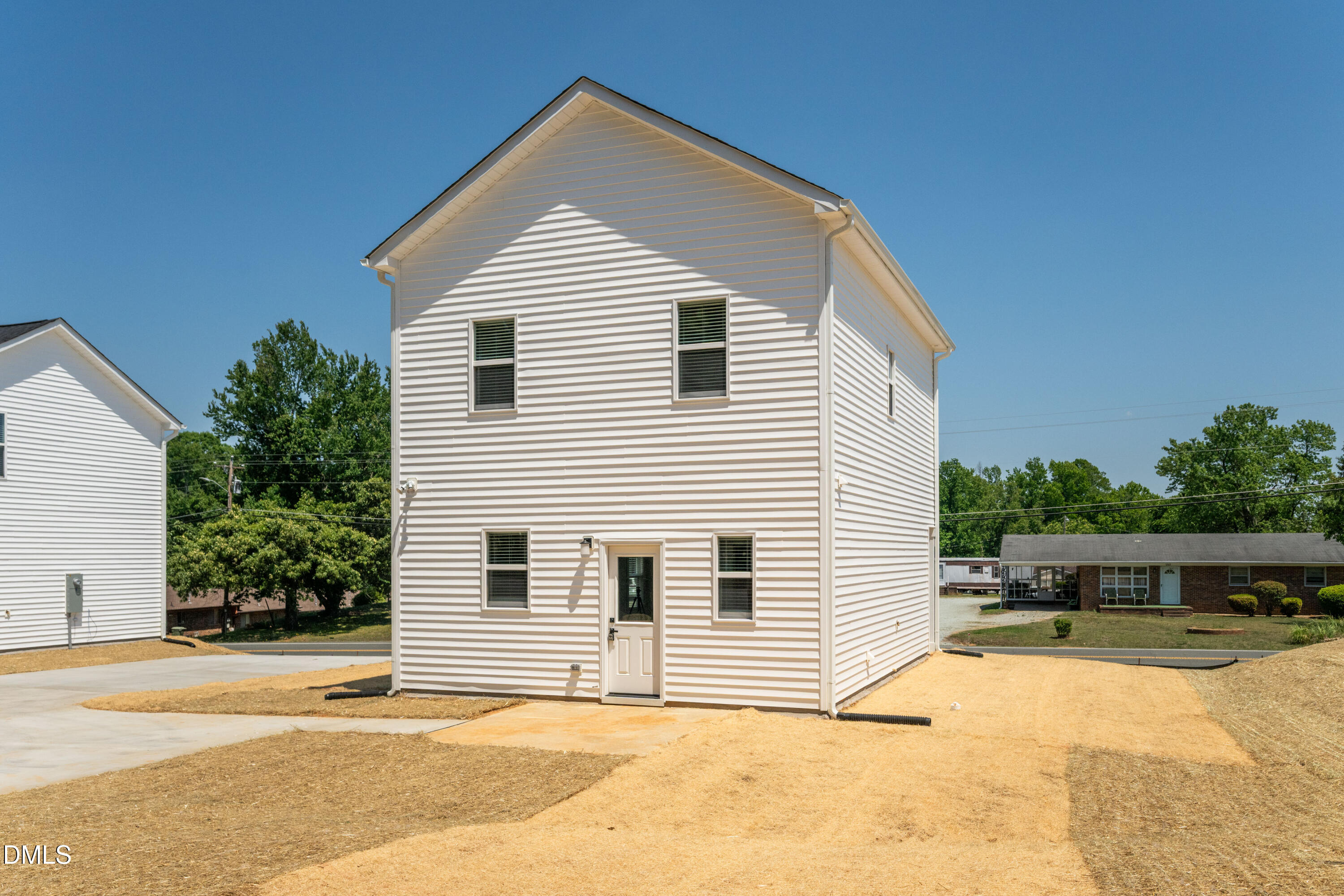1196 Hurdle Mills Road Roxboro, NC 27573 - Photo 46 of 50 a view of a house with a patio