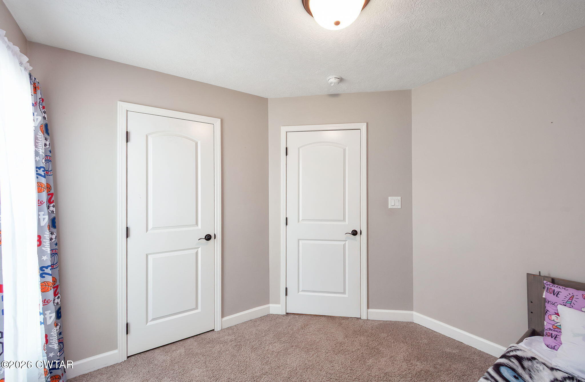 255 Taylor Drive Bells, TN 38006 - Photo 18 of 28 an empty room with a door