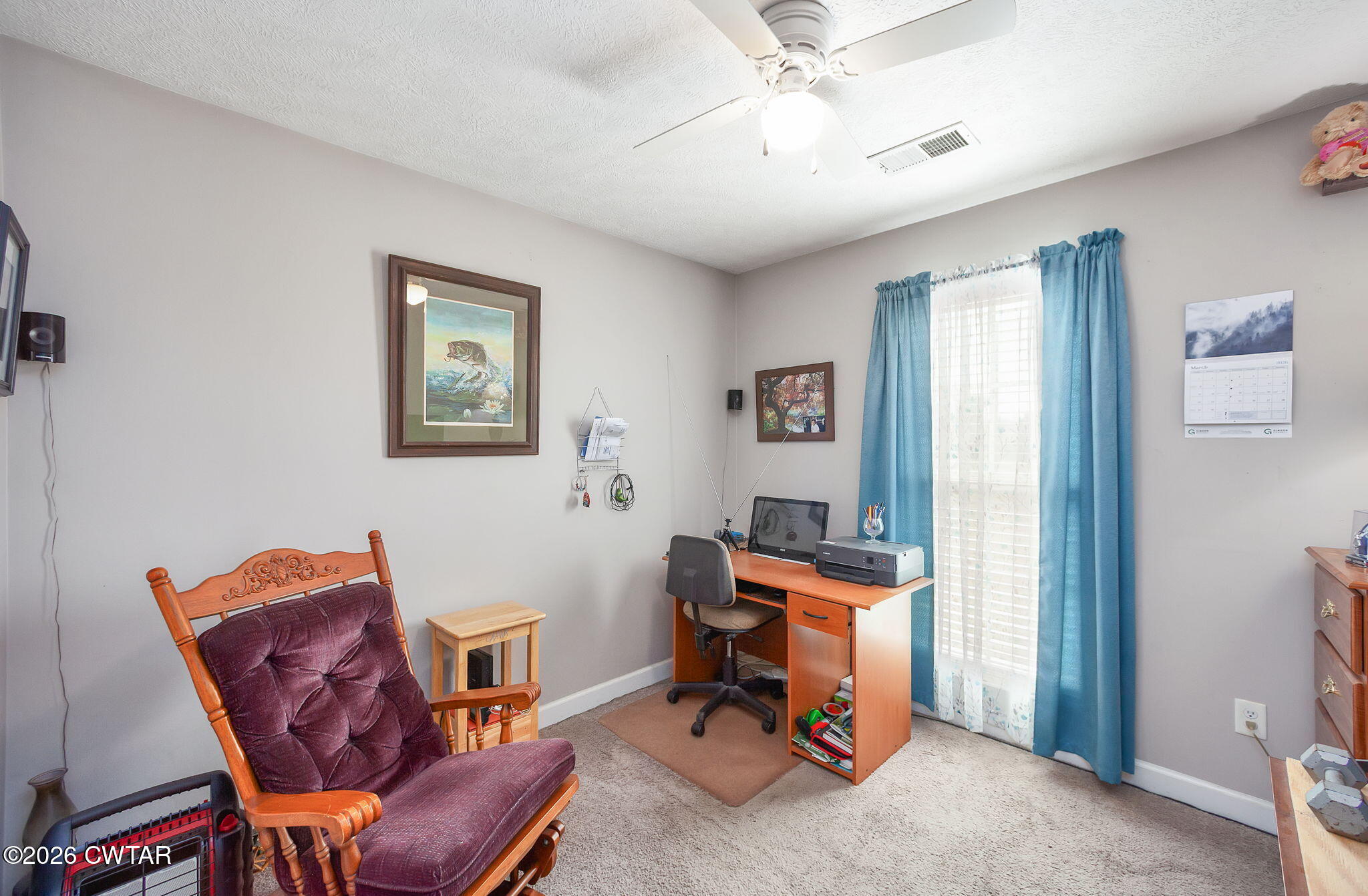 255 Taylor Drive Bells, TN 38006 - Photo 19 of 28 a view of a workspace with furniture and a window