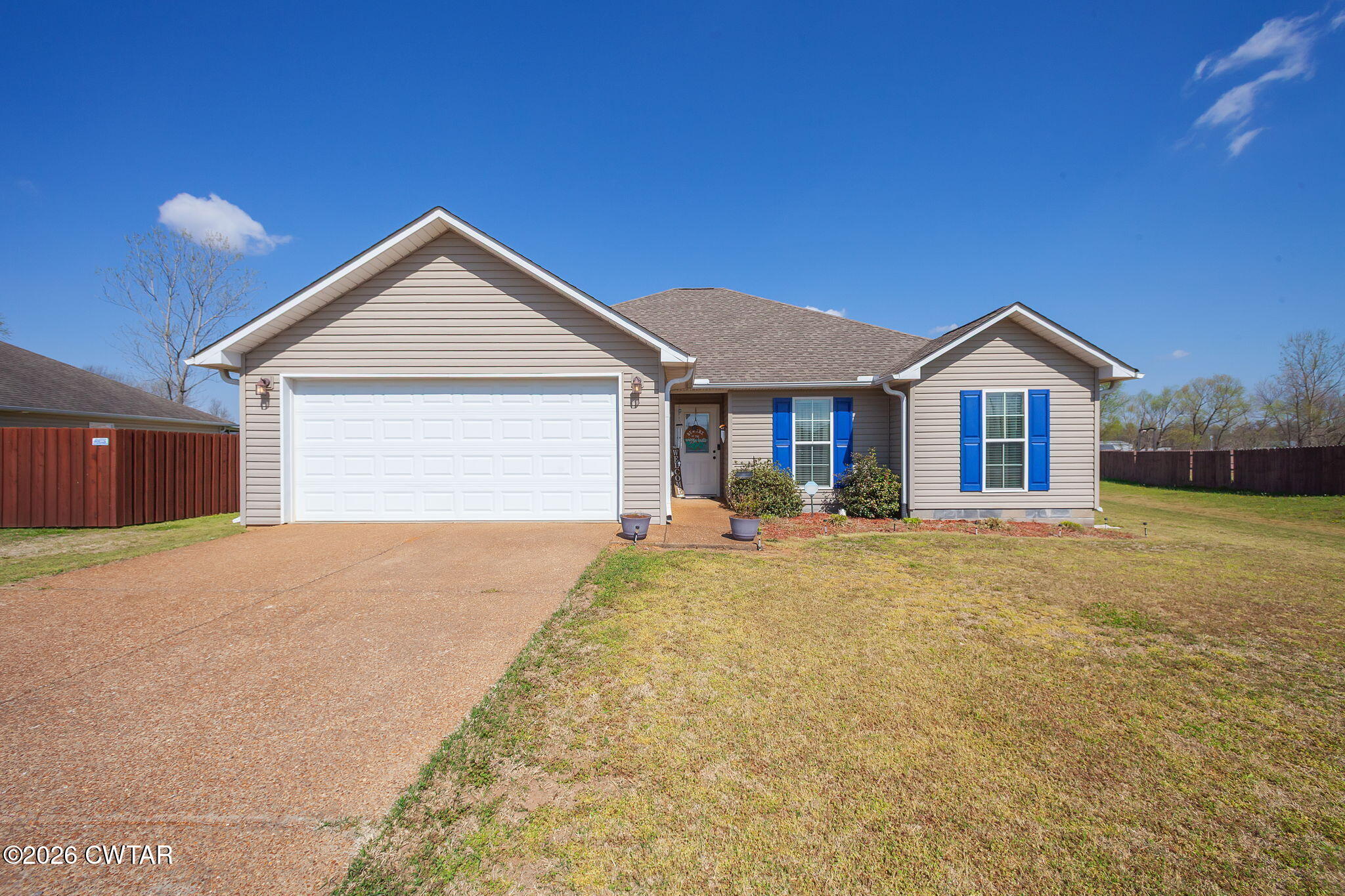 255 Taylor Drive Bells, TN 38006 - Photo 2 of 28 a house with outdoor space