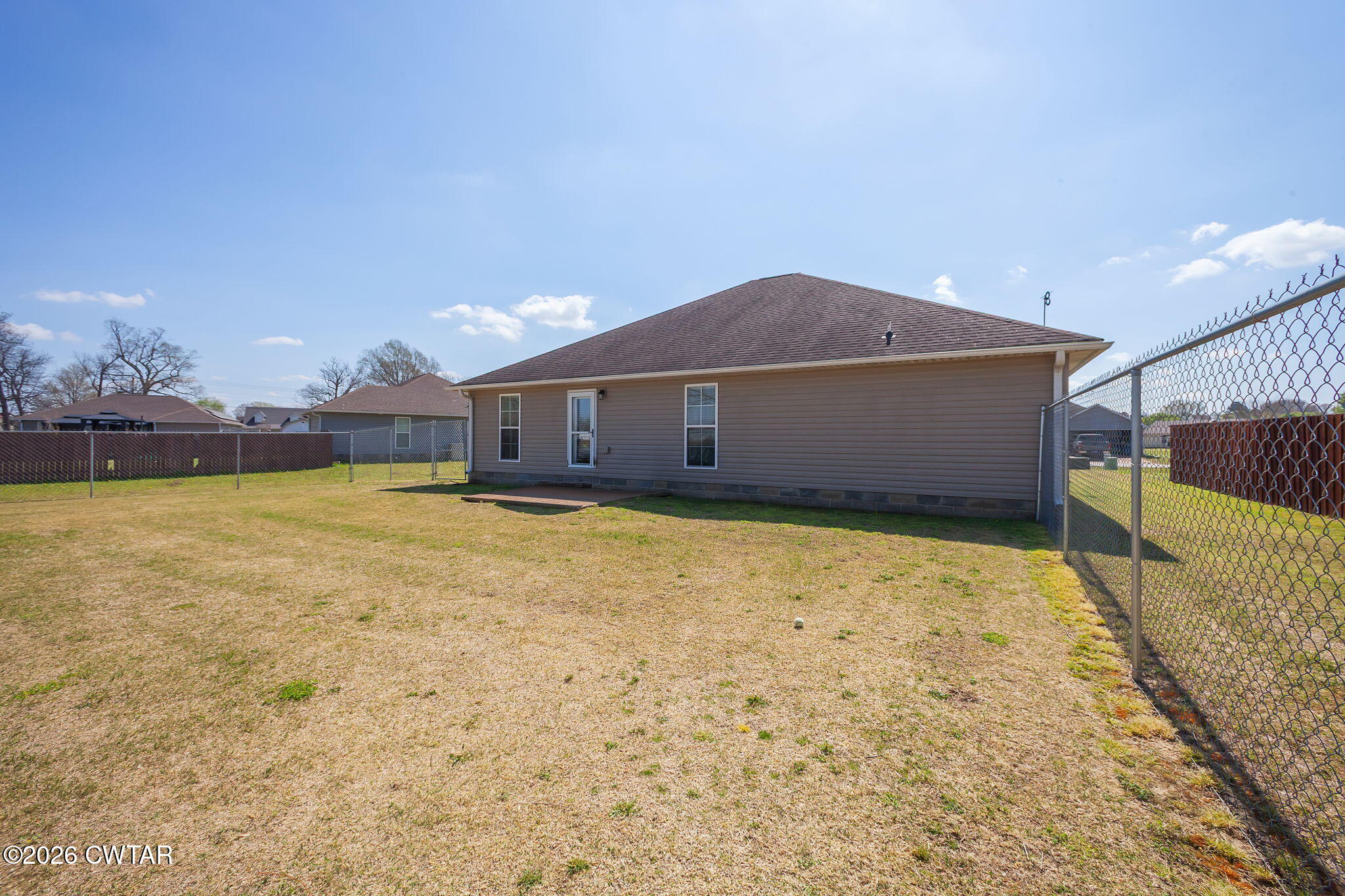 255 Taylor Drive Bells, TN 38006 - Photo 27 of 28 a house with swimming pool in front of it