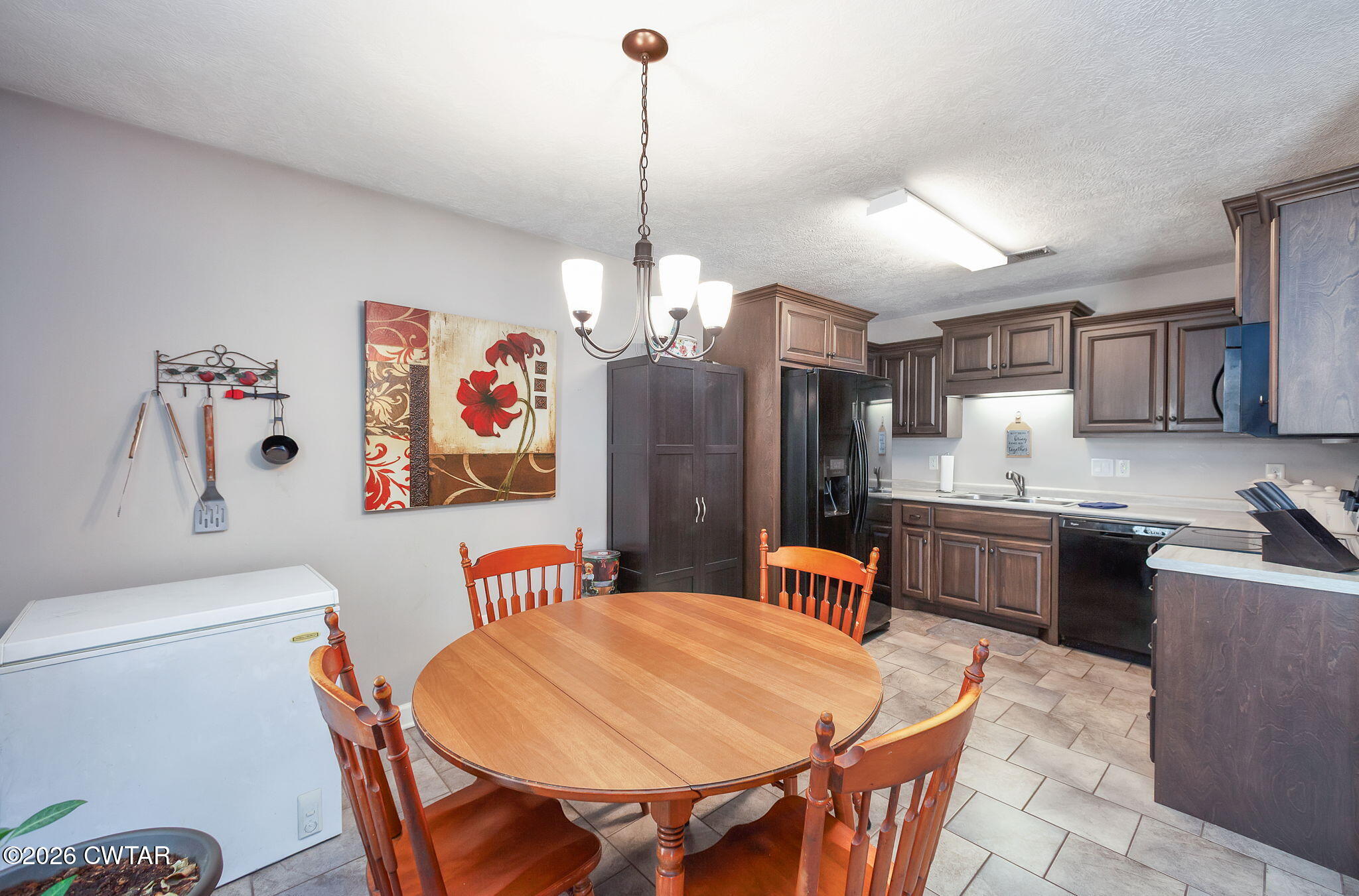 255 Taylor Drive Bells, TN 38006 - Photo 3 of 28 a dinning area with stainless steel appliances kitchen island granite countertop furniture and a kitchen view