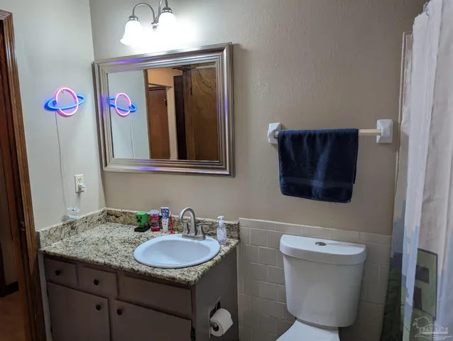 a view of outdoor space with wooden fence