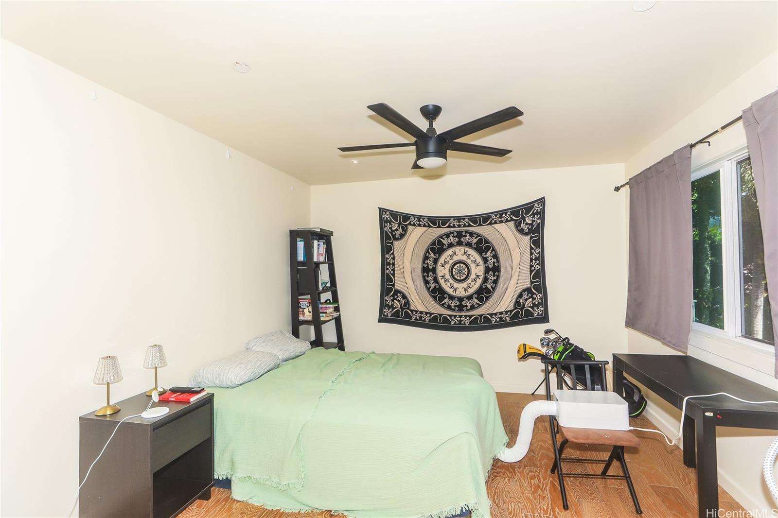 3702 Old Pali Road Honolulu, HI 96817 - Photo 20 of 25 a living room with couch and a large window