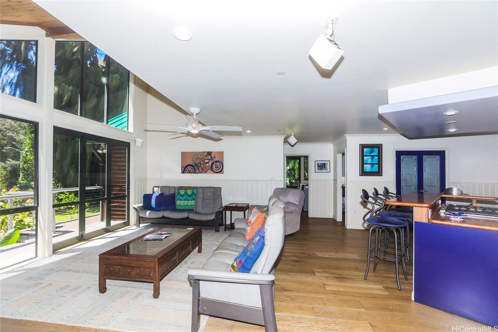 3702 Old Pali Road Honolulu, HI 96817 - Photo 5 of 25 a living room with furniture and a large window