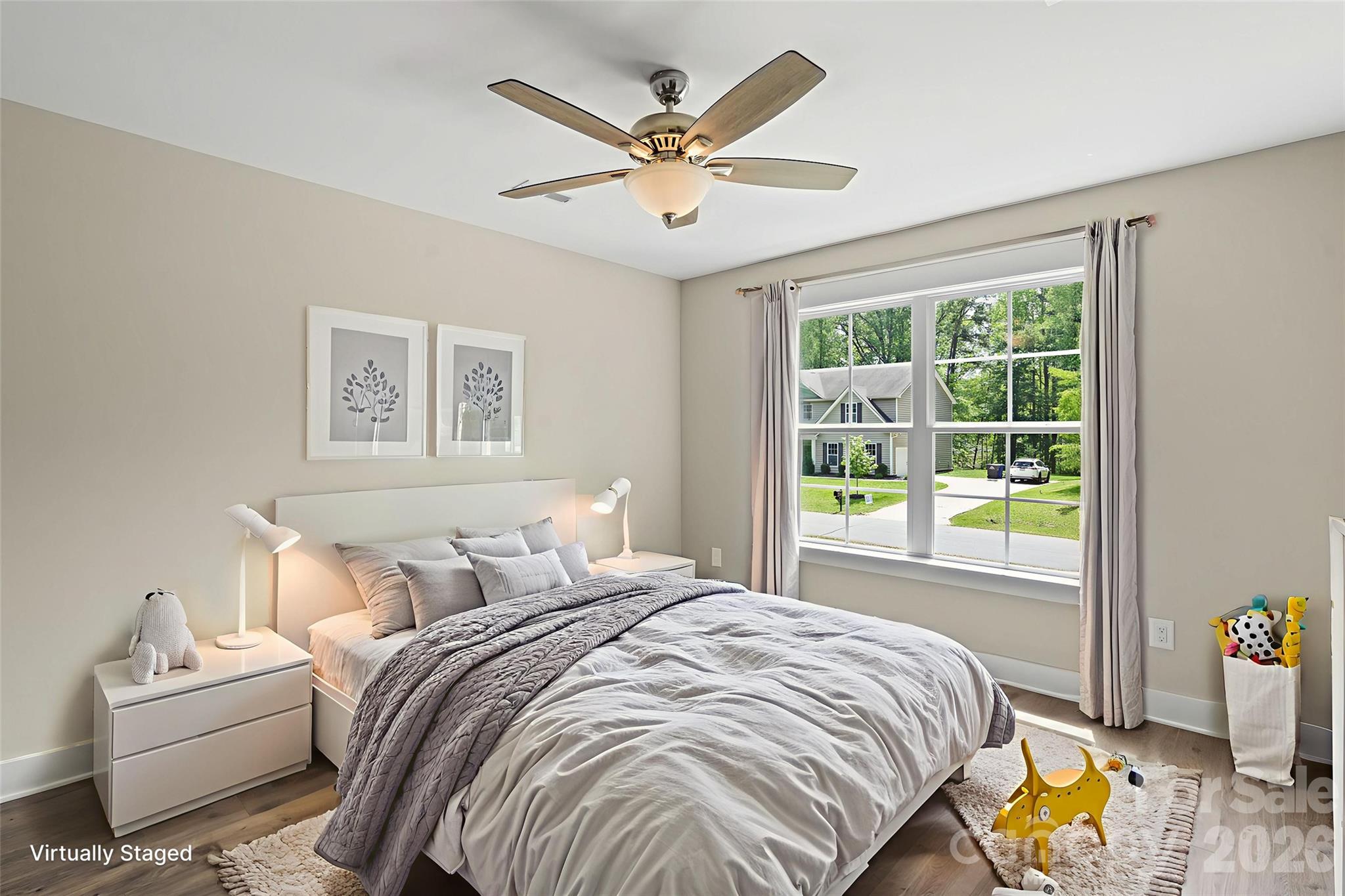 156 Clear Springs Road Mooresville, NC 28115 - Photo 18 of 28 a bedroom with a bed and a large window with outer view