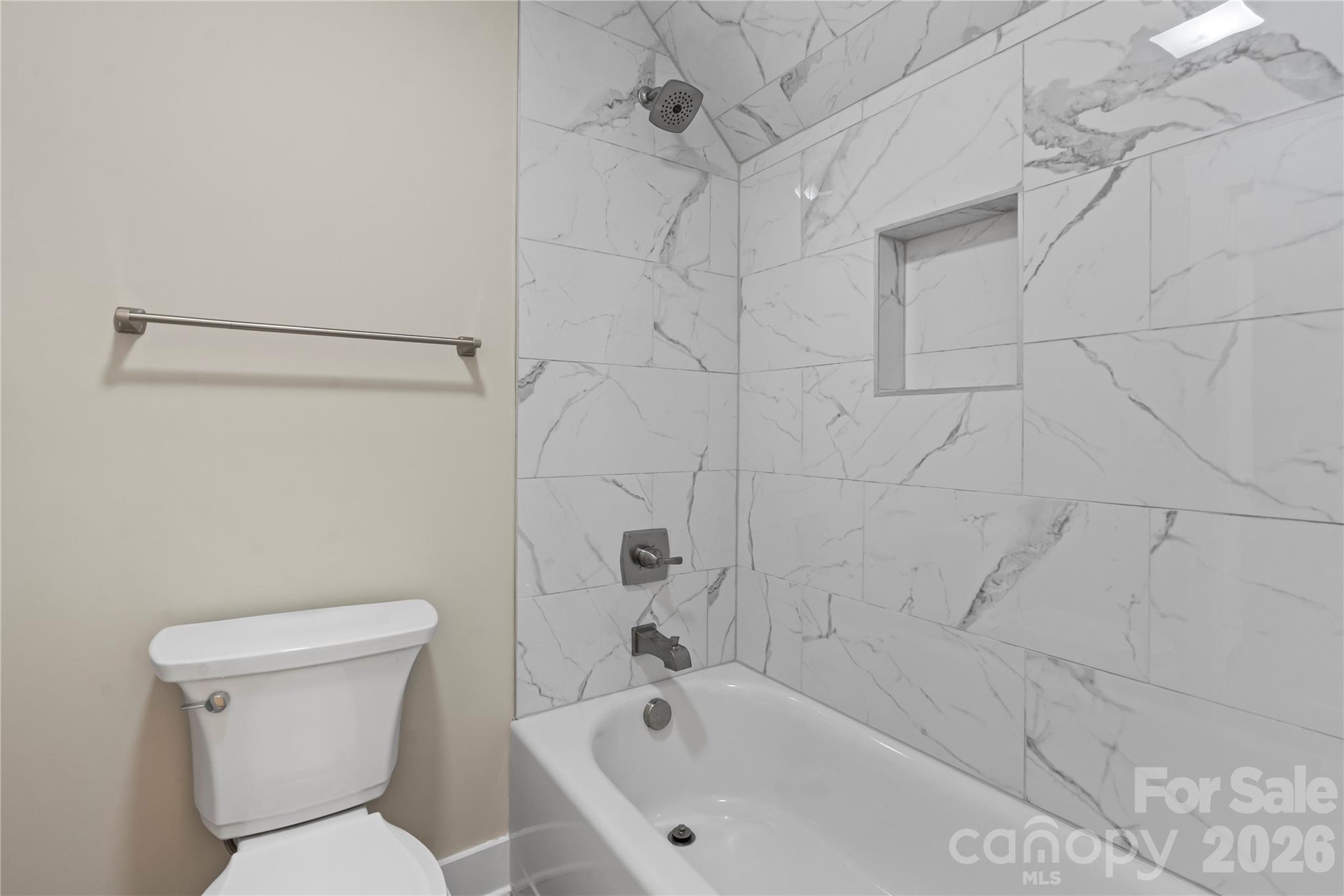 156 Clear Springs Road Mooresville, NC 28115 - Photo 21 of 28 a white toilet sitting next to a bath tub and a shower