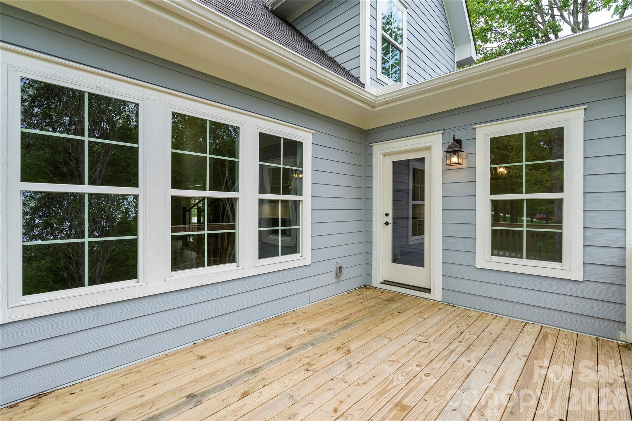 156 Clear Springs Road Mooresville, NC 28115 - Photo 26 of 28 a view of a house with a large window