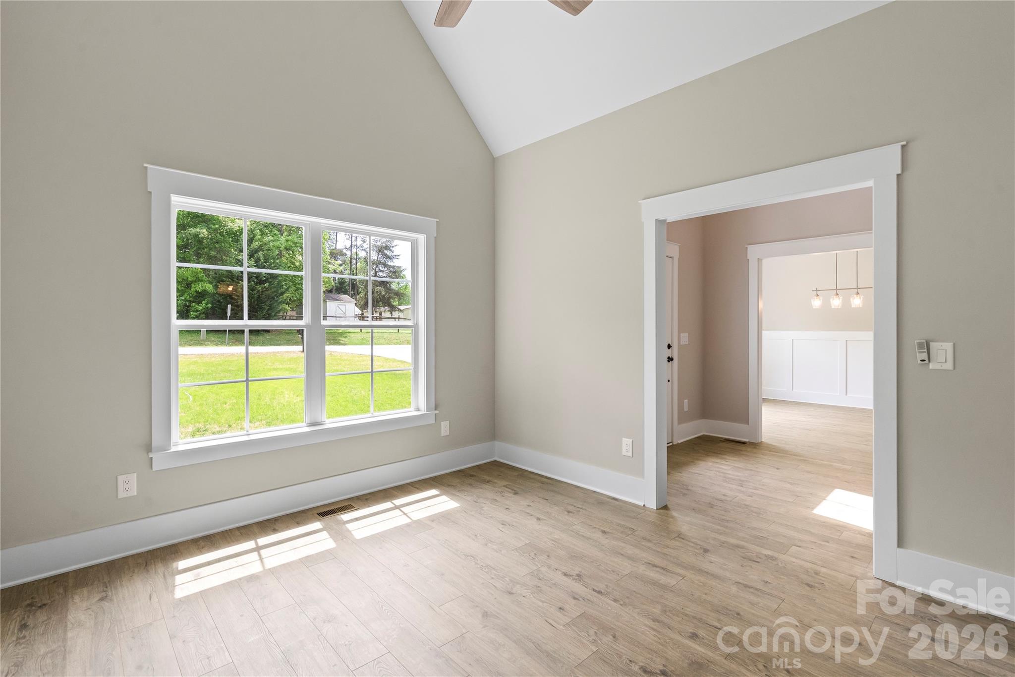 156 Clear Springs Road Mooresville, NC 28115 - Photo 6 of 28 an empty room with a window