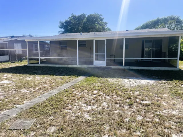 a view of a backyard of a house