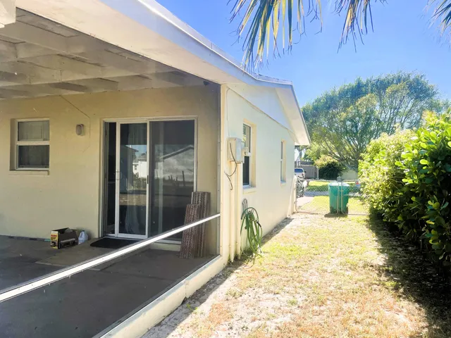 a view of a room with a large window