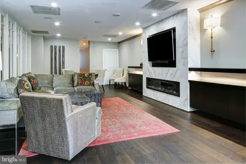 a view of a big dining room with furniture window and outside view