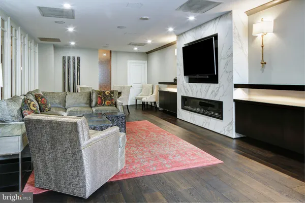a view of a big dining room with furniture window and outside view