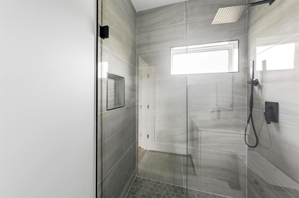 1113 East Oleander Street Fort Worth, TX 76104 - Photo 28 of 39 Bathroom with a shower stall