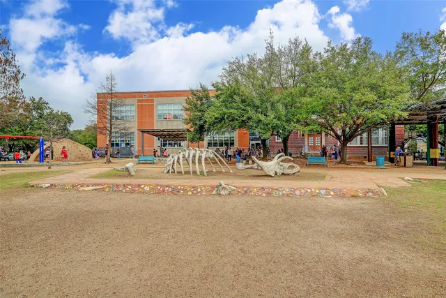 a group of cars parked on the side of a street