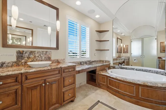 a bedroom with bed and window