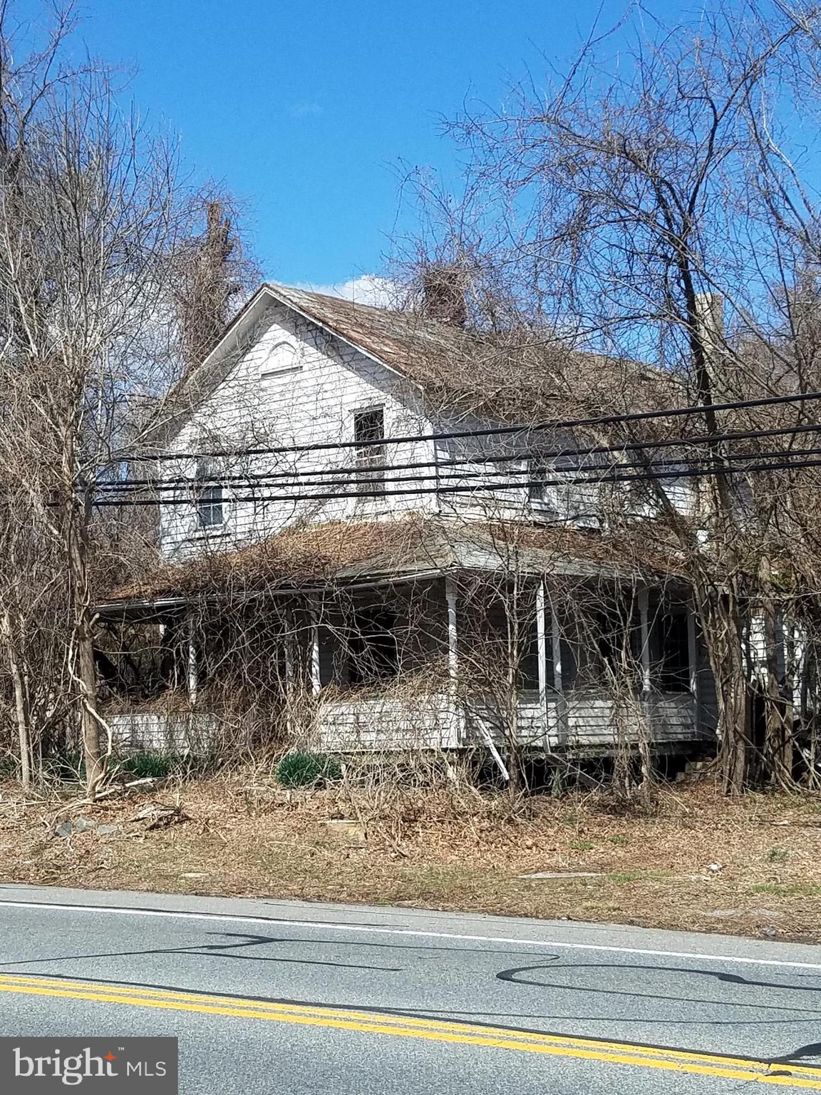 4450 Hawthorne Road Indian Head, MD 20640 - Photo 13 of 17 a view of a white house next to a road