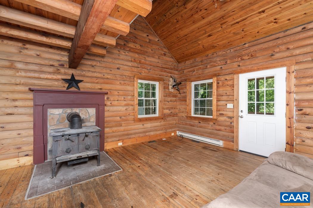45 Middle Lane Road Grottoes, VA 24441 - Photo 3 of 64 a porch with seating space
