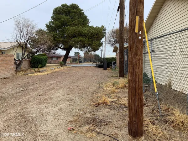 a view of a street with a houses
