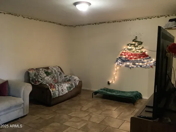 a view of a hallway with seating area