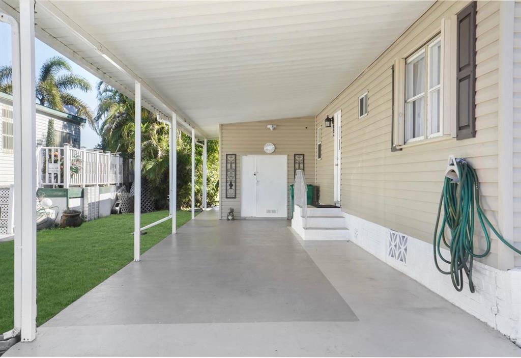 1830 Southwest 83rd Avenue Davie, FL 33324 - Photo 12 of 33 a view of a house with a yard