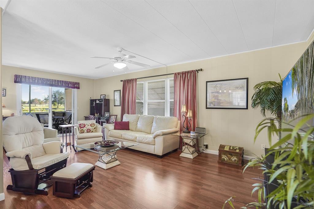 1830 Southwest 83rd Avenue Davie, FL 33324 - Photo 19 of 33 a living room with furniture or couch and a window