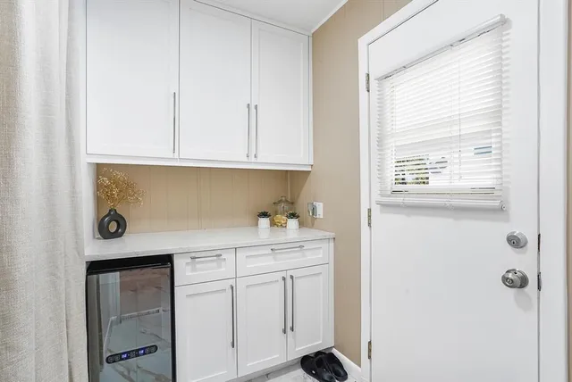 a view of cabinets and window