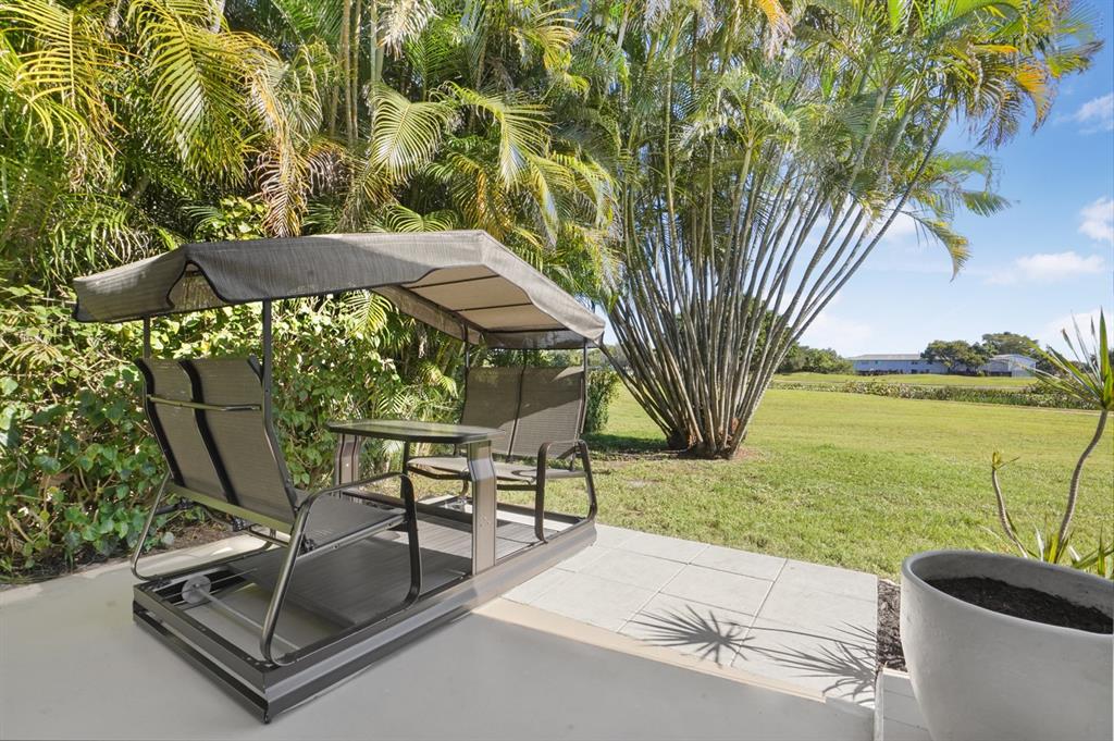 1830 Southwest 83rd Avenue Davie, FL 33324 - Photo 26 of 33 a view of a backyard with sitting area and furniture