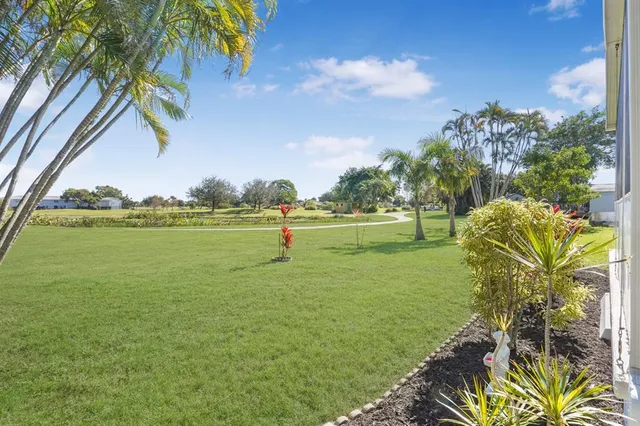 a view of a golf course with a lake