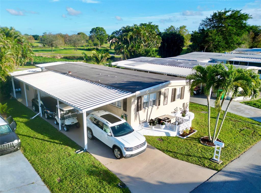 1830 Southwest 83rd Avenue Davie, FL 33324 - Photo 30 of 33 an aerial view of a house with a garden