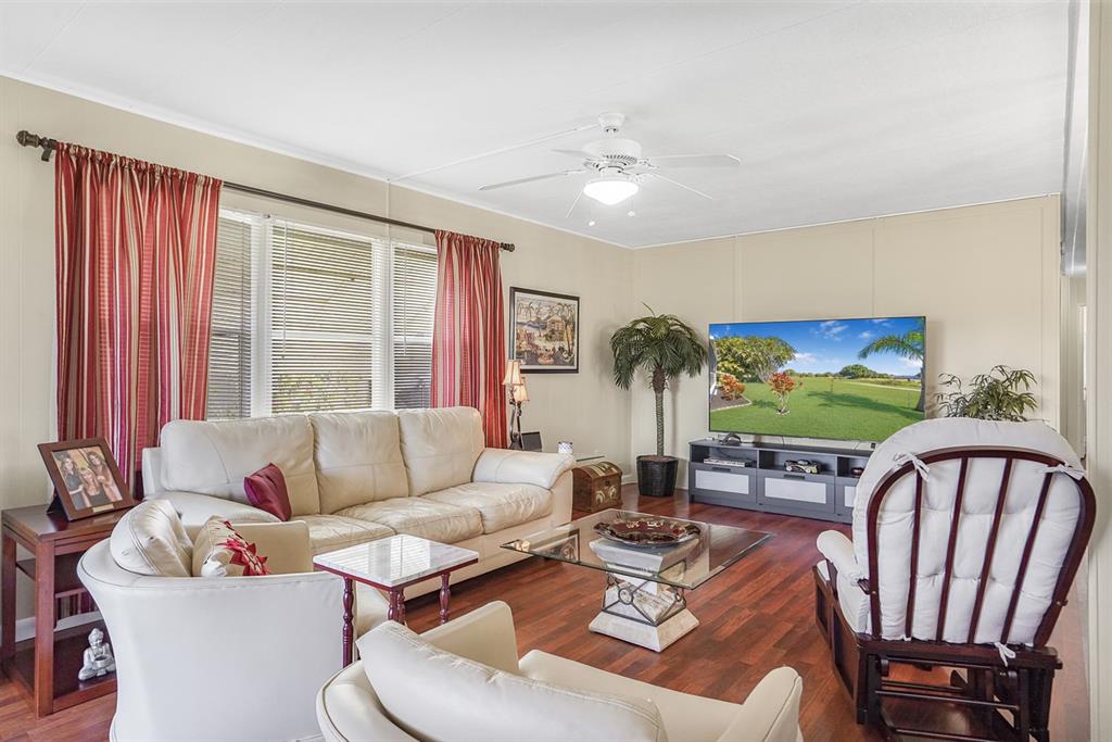 1830 Southwest 83rd Avenue Davie, FL 33324 - Photo 7 of 33 a living room with furniture and a large window