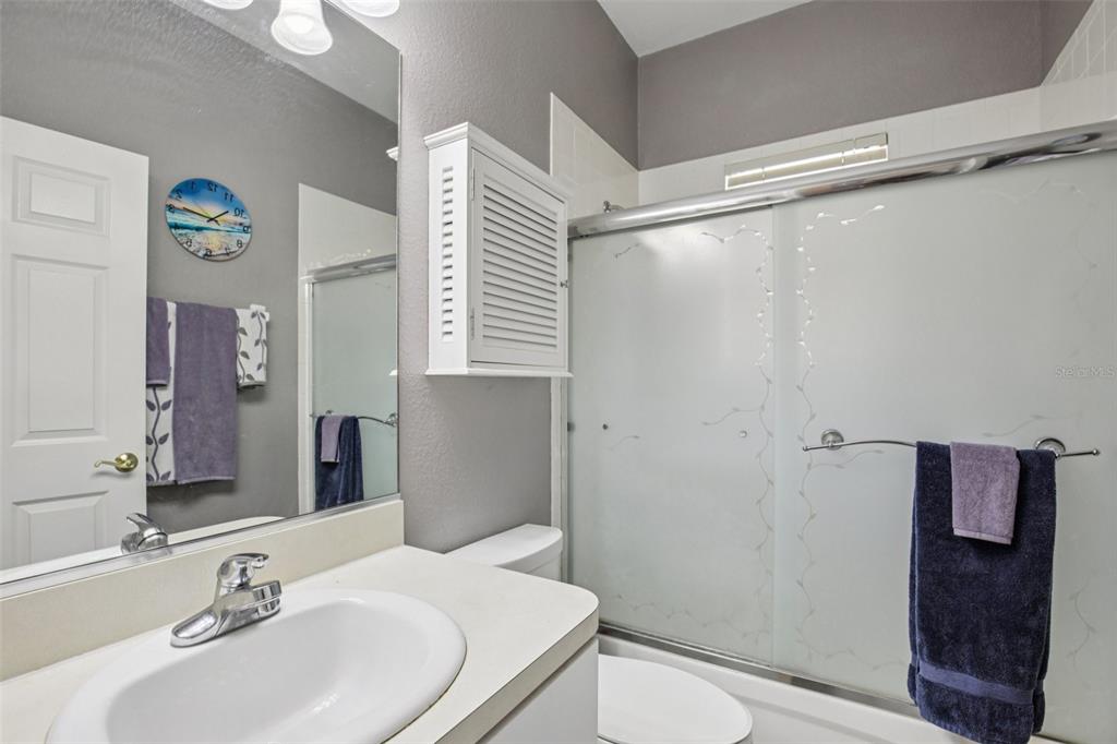 24567 Buckingham Way Punta Gorda, FL 33980 - Photo 24 of 46 a bathroom with a sink toilet and shower
