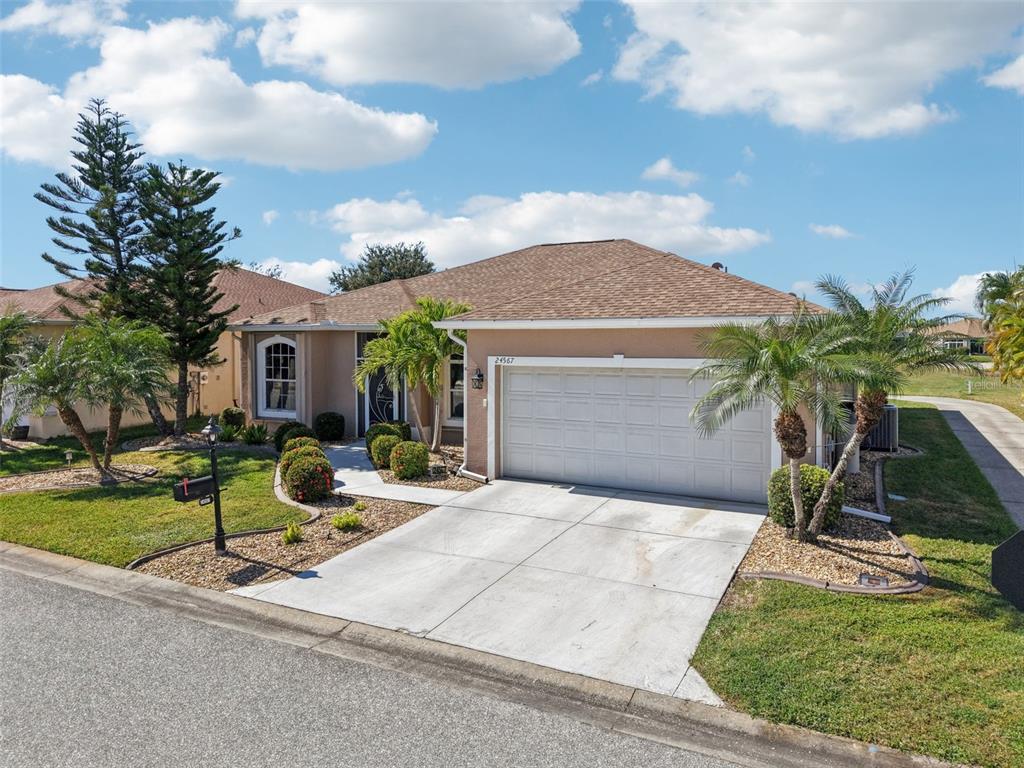 24567 Buckingham Way Punta Gorda, FL 33980 - Photo 41 of 46 a view of a house with backyard and sitting area