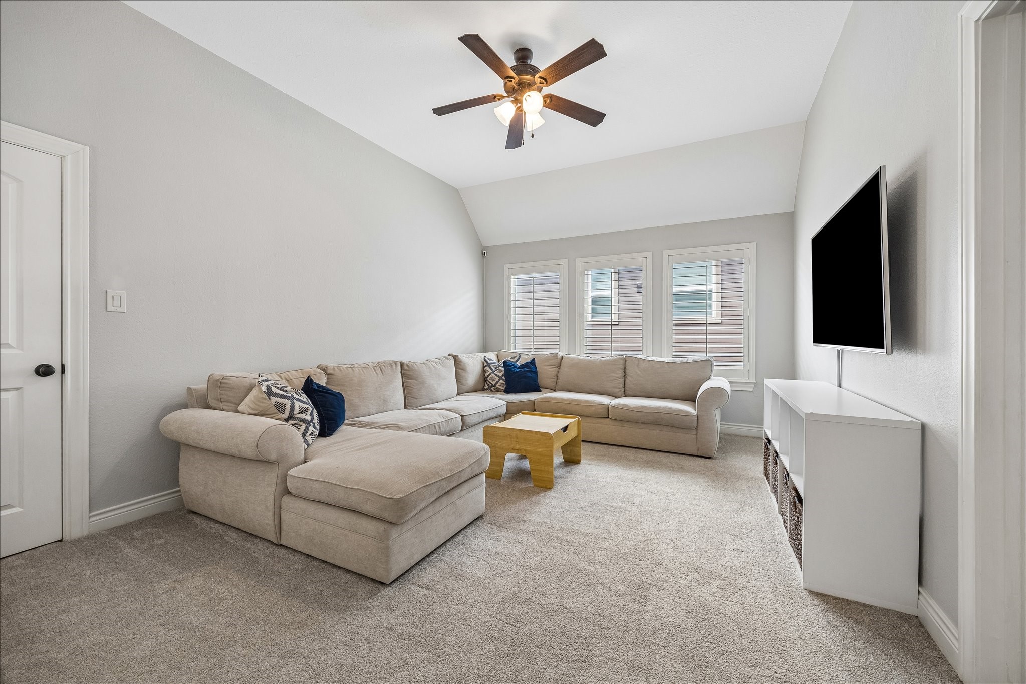 1616 Hewitt Drive Houston, TX 77018 - Photo 17 of 44 Large upstairs game room offers plenty of space for relaxing or entertaining, with soft carpet and natural light from multiple windows.