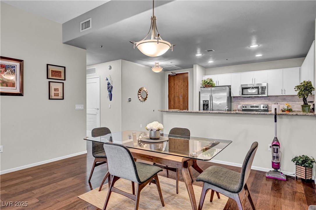 8255 South Las Vegas Boulevard, Unit 1715 Las Vegas, NV 89123 - Photo 16 of 49 Large area accommodates many sizes of dining room tables.