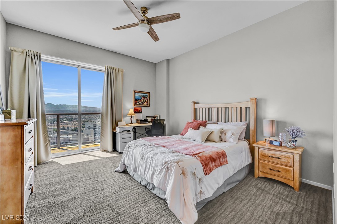 8255 South Las Vegas Boulevard, Unit 1715 Las Vegas, NV 89123 - Photo 18 of 49 Plush carpeted primary suite featuring access to the balcony and sunrise views.