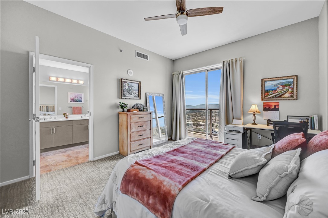 8255 South Las Vegas Boulevard, Unit 1715 Las Vegas, NV 89123 - Photo 20 of 49 Primary suite with en-suite bathroom; spacious enough to accommodate small office area as well.