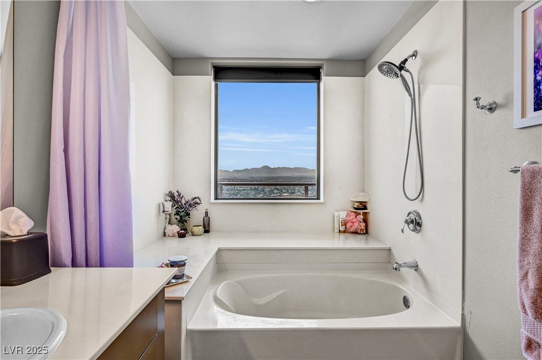 8255 South Las Vegas Boulevard, Unit 1715 Las Vegas, NV 89123 - Photo 24 of 49 Enjoy the sunshine from your primary bathroom featuring tub/shower combo.