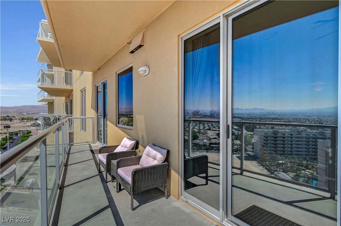 8255 South Las Vegas Boulevard, Unit 1715 Las Vegas, NV 89123 - Photo 31 of 49 Access the oversized balcony from the great room and primary suite.
