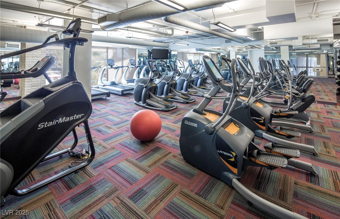 8255 South Las Vegas Boulevard, Unit 1715 Las Vegas, NV 89123 - Photo 41 of 49 2nd floor features cardio equipment, punching bag, and a separate room with Pilates machine, and TRX wall.