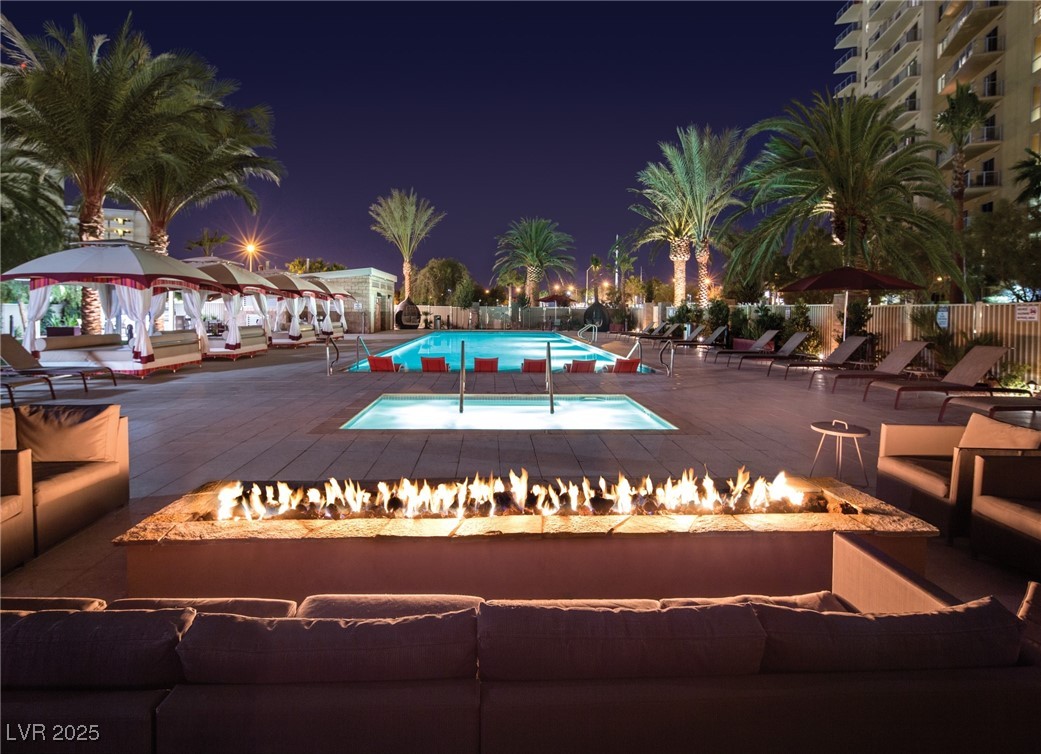 8255 South Las Vegas Boulevard, Unit 1715 Las Vegas, NV 89123 - Photo 47 of 49 Fire pit at night is the perfect way to end the day!